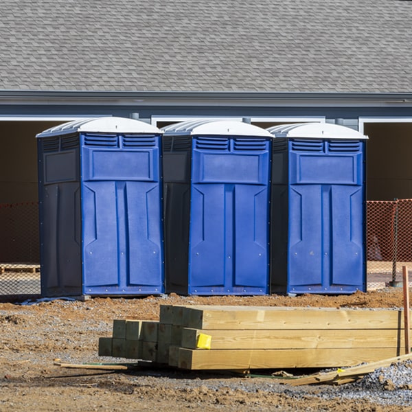 what is the cost difference between standard and deluxe porta potty rentals in Walnut Grove